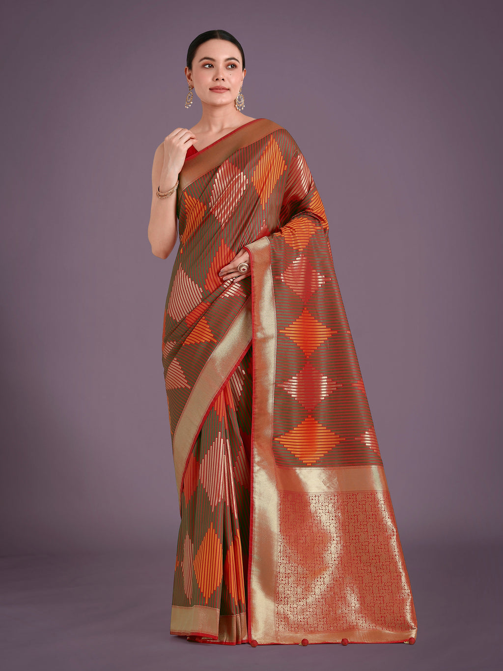 Red Banarasi silk saree with ornate gold zari weaving