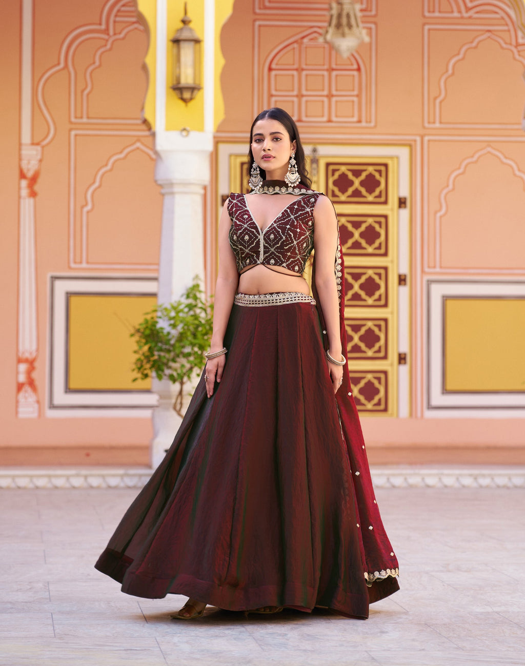 Maroon Fendy Satin lehenga choli set with heavy sequins and thread embroidery.