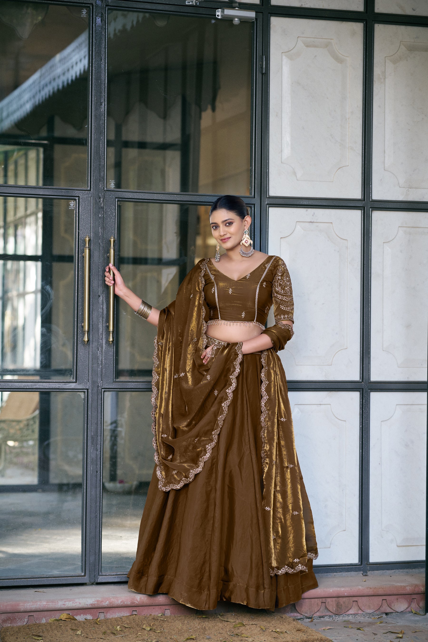 Brown Fendi Silk Lehenga Choli with detailed sequin and thread embroidery work
