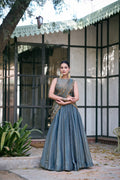 Teal Fendi Silk Lehenga Choli with intricate sequins and thread embroidery work