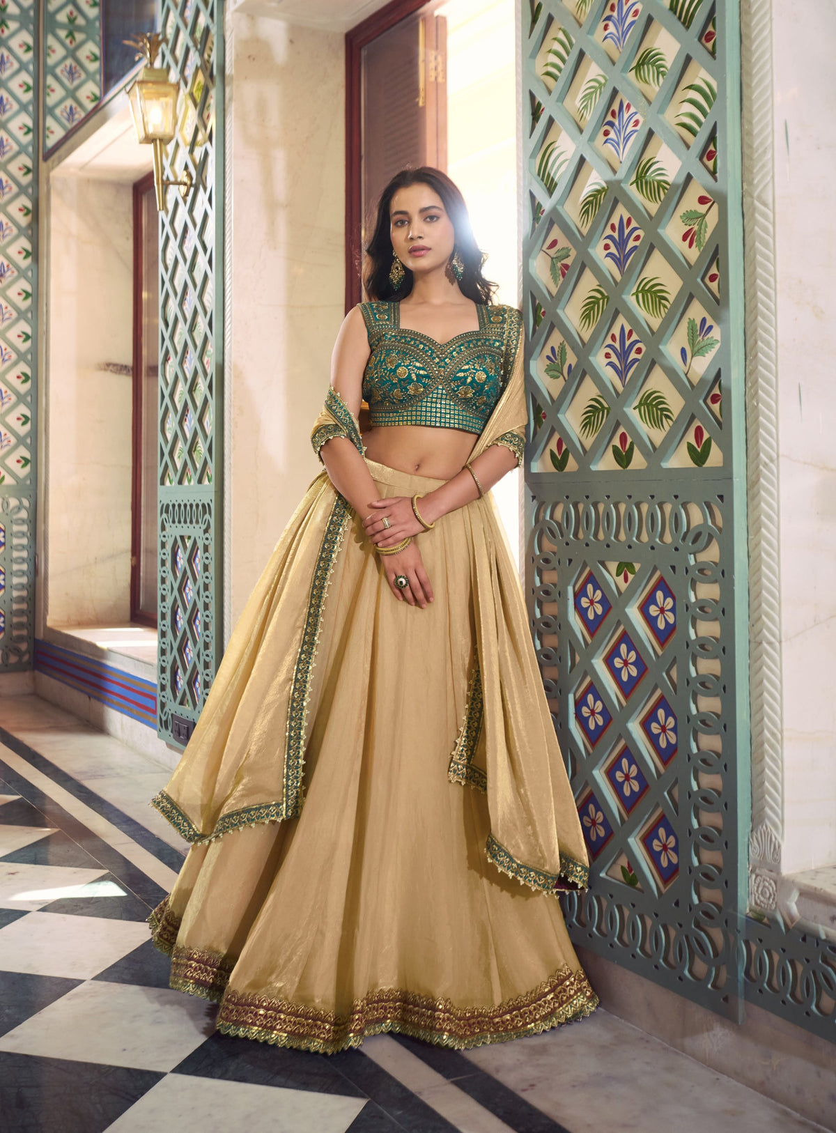 Cream Fendi silk lehenga choli with elegant lace accents and coordinating dupatta