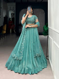 Seagreen lehenga choli with intricate gold coin beads and delicate thread embroidery