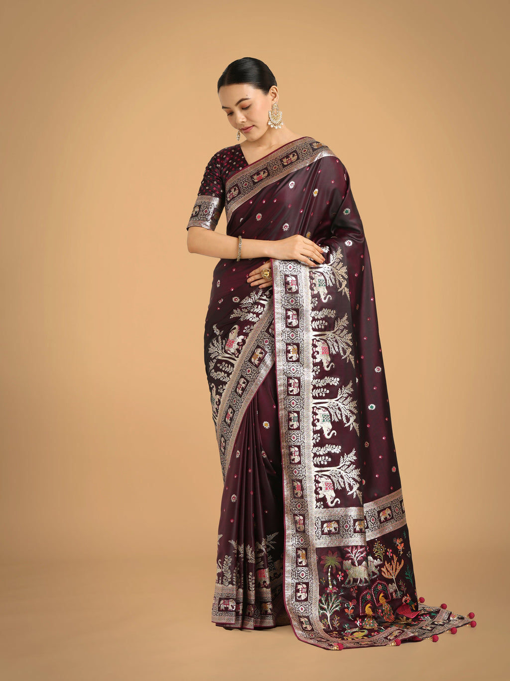 Wine colored Banarasi satin silk saree with detailed zari weaving