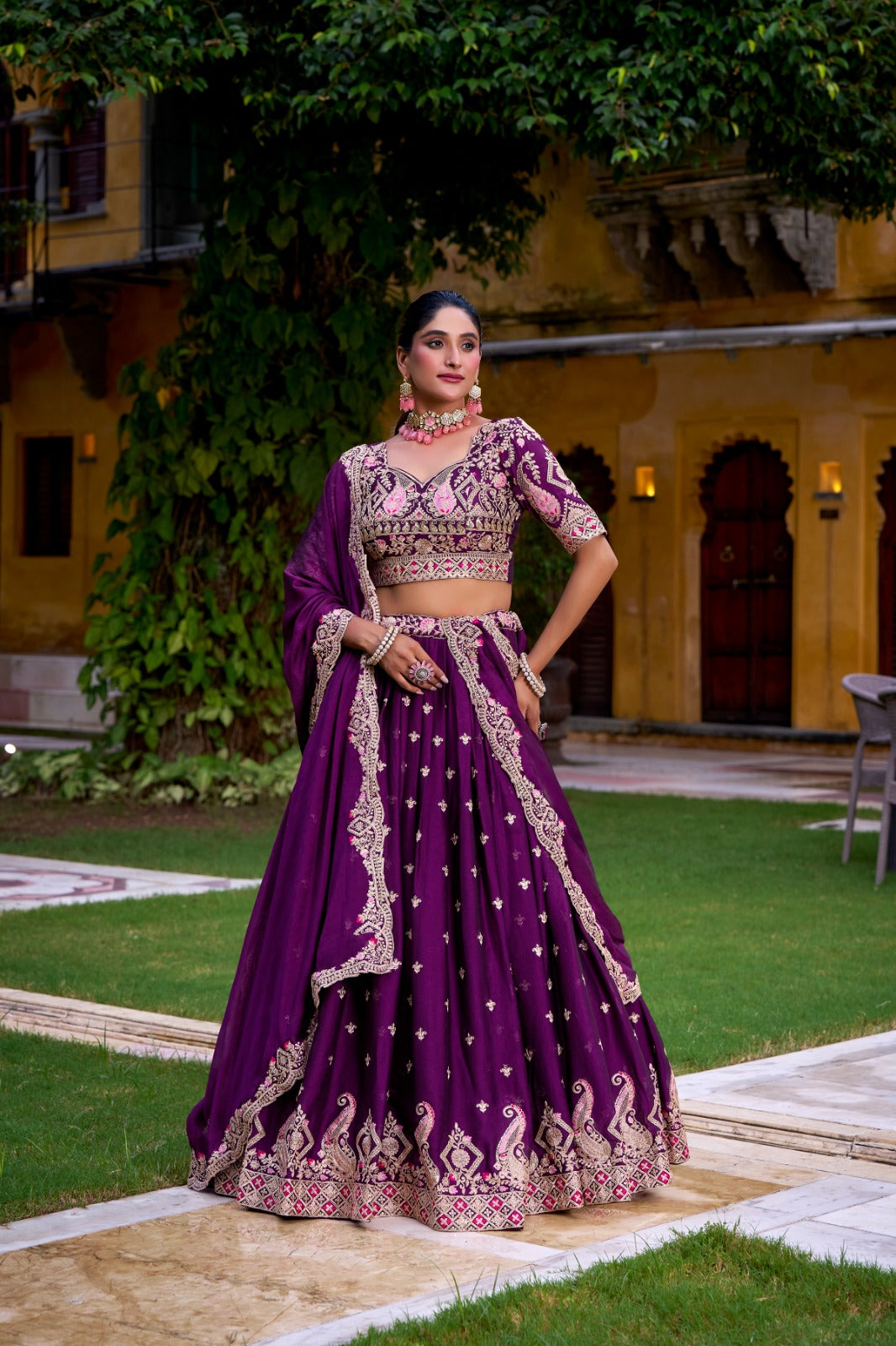 Elegant purple Rangoli crush lehenga choli adorned with sequin work and intricate thread embroidery, including a matching dupatta.