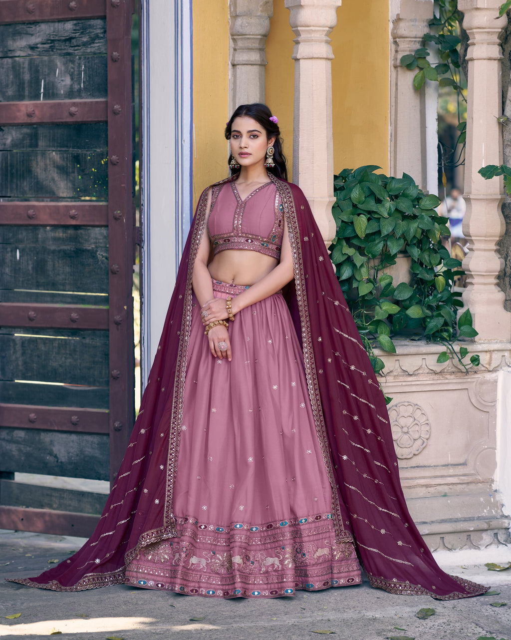 Pink star georgette lehenga choli with zari, sequins, and Resham embroidery.