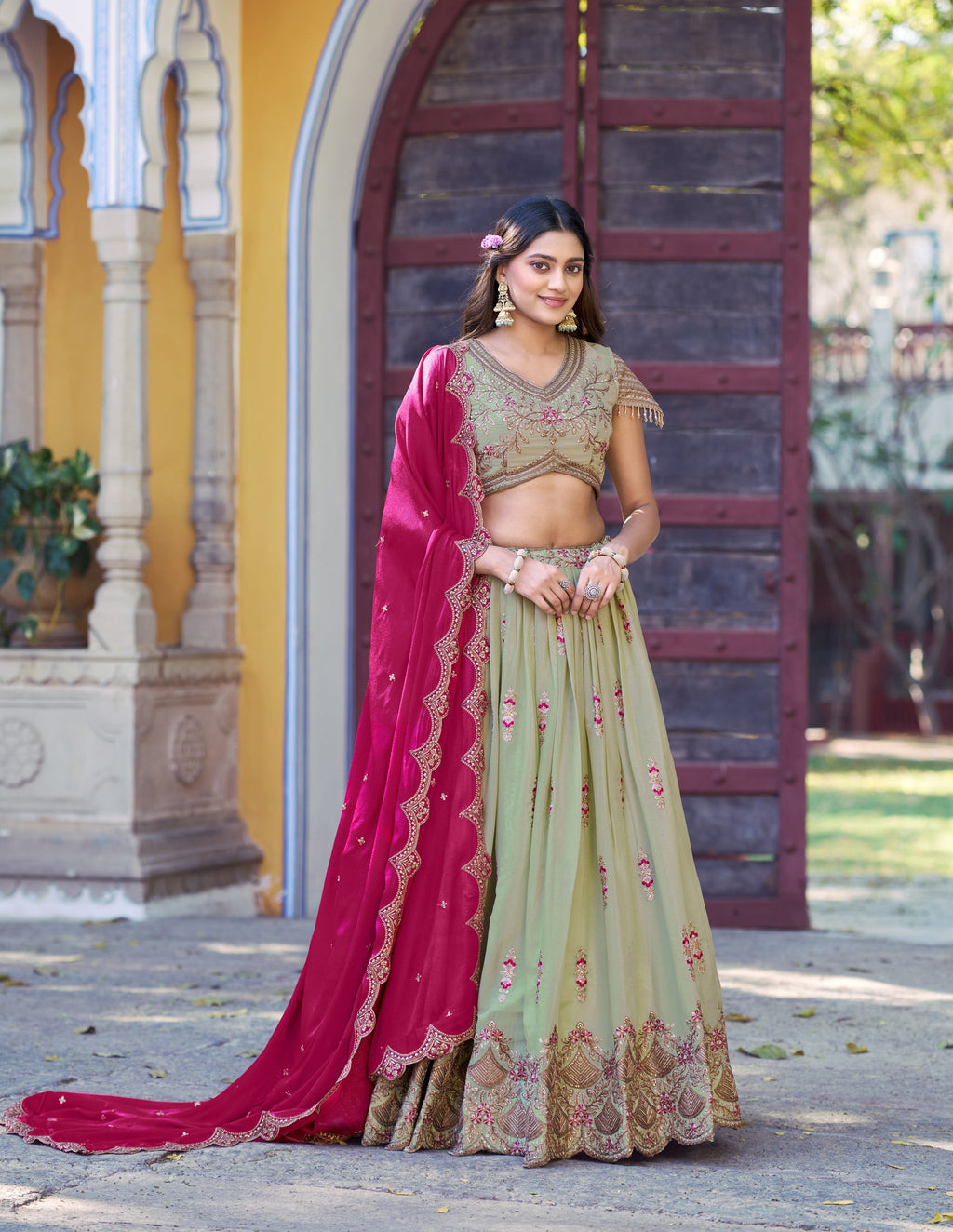 Pista green Star Georgette lehenga choli with heavy Zari, sequin, and Resham embroidery.