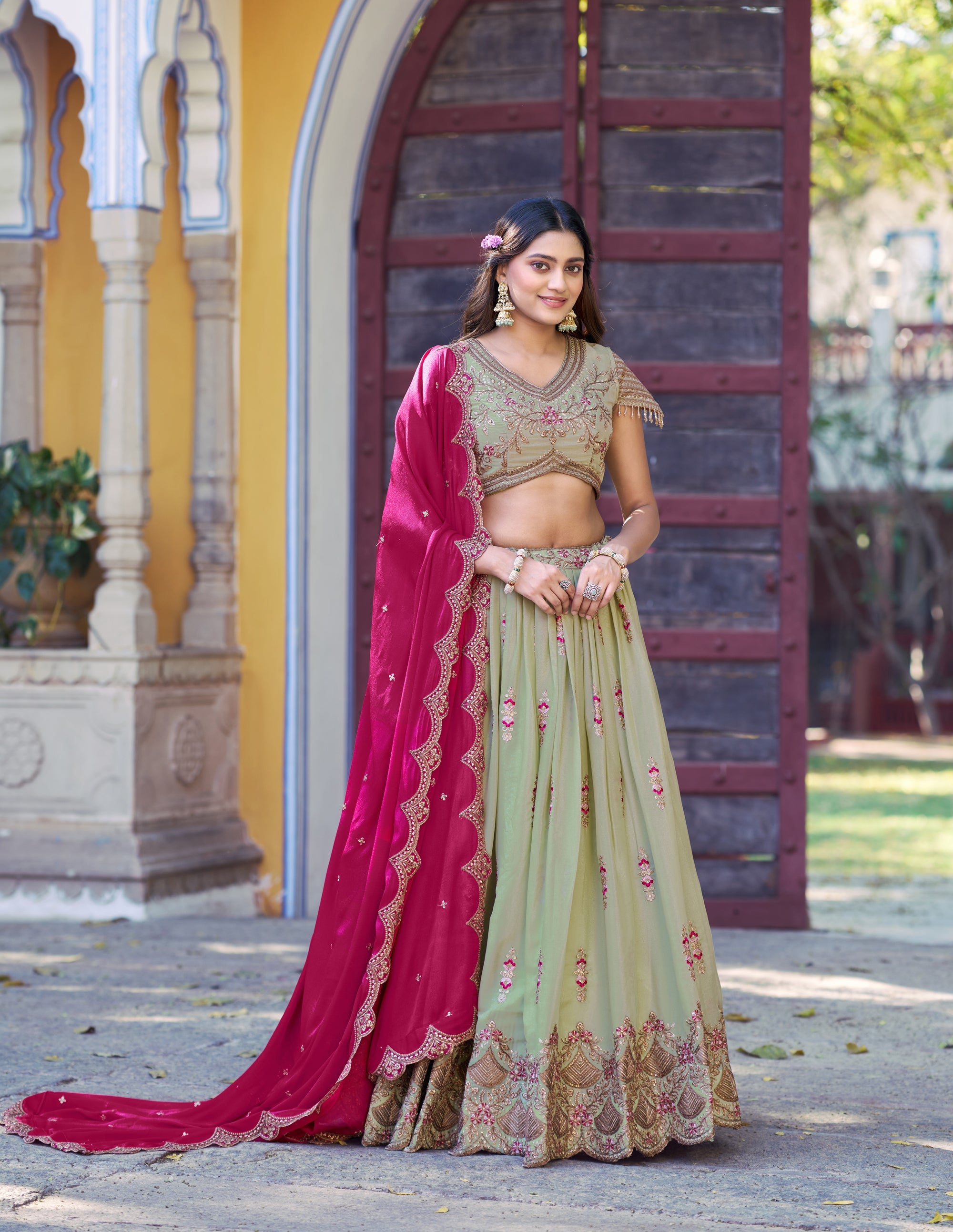 Pista green Star Georgette lehenga choli with heavy Zari, sequin, and Resham embroidery.