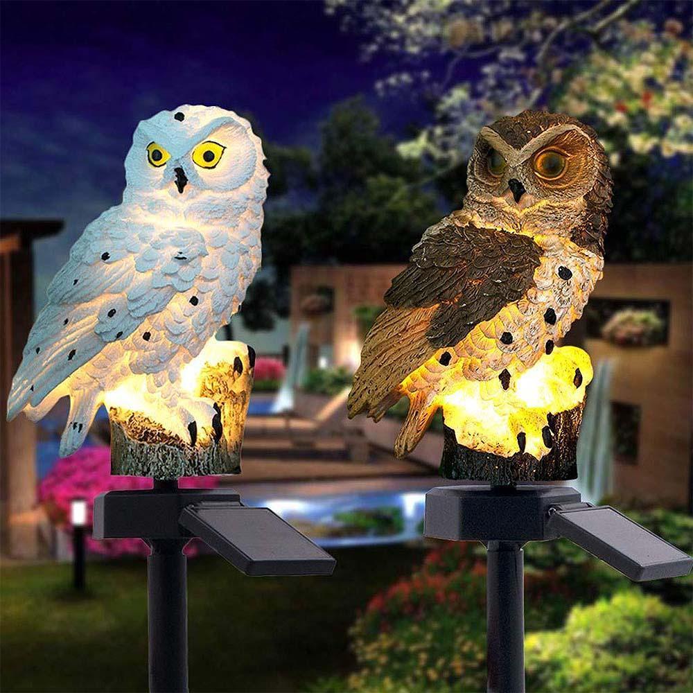 Detailed brown and white owl solar LED garden lamp with a sturdy stand