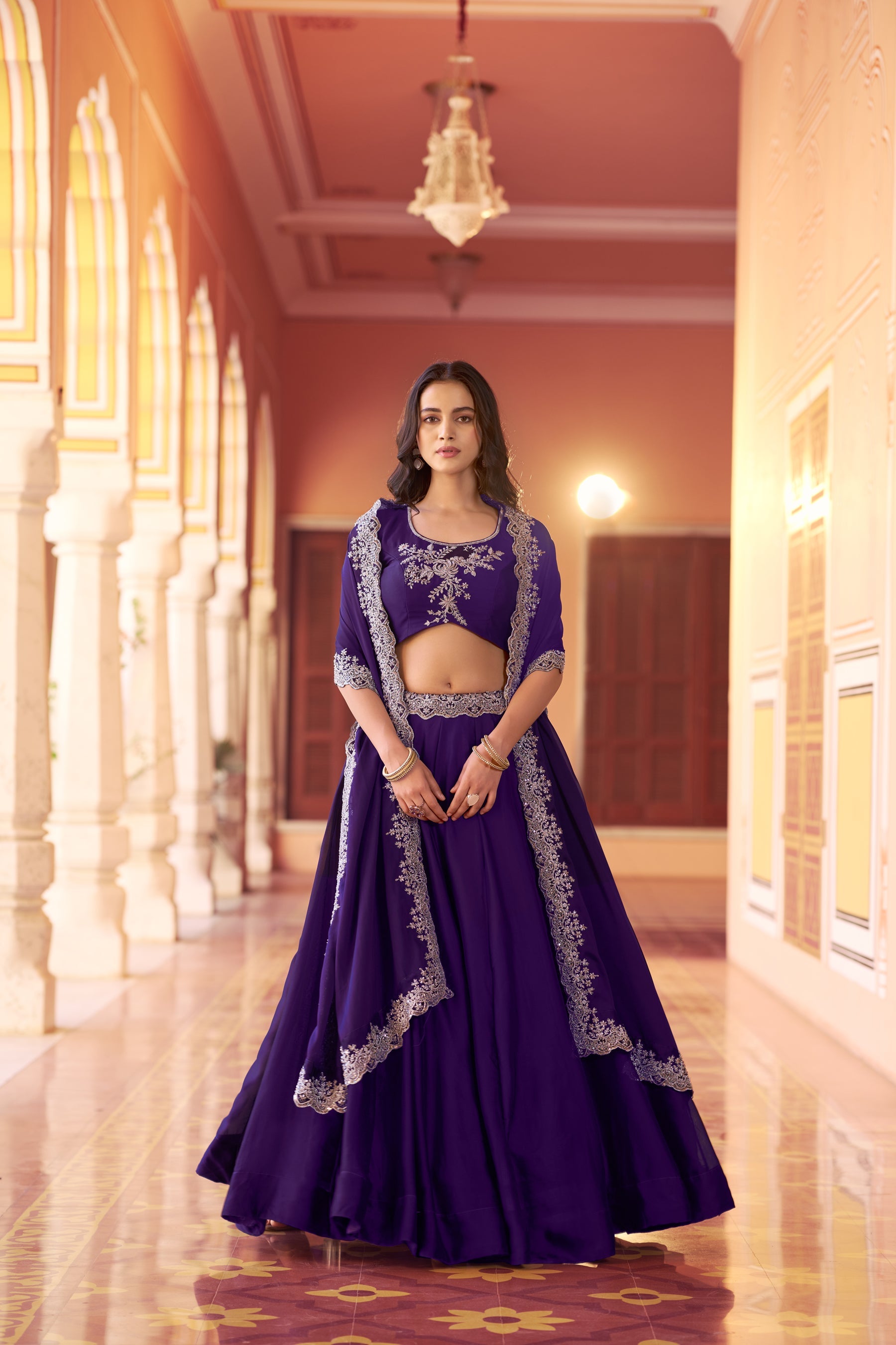 Purple Rangoli silk lehenga choli with heavy embroidery, sequence work, and matching dupatta