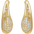 Modern medium-sized Élodie pavé diamond huggie hoops in polished 14K yellow gold.