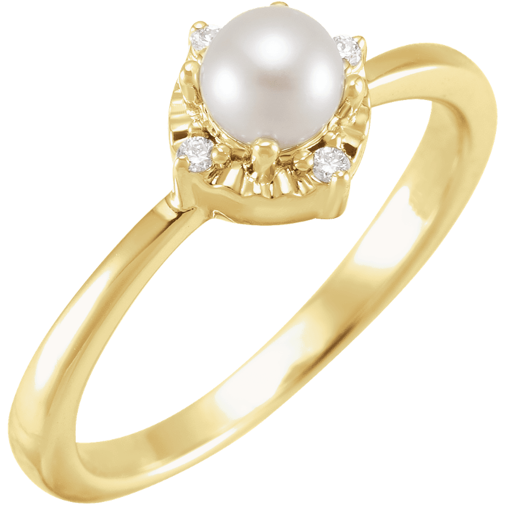 Pearla Diamond Halo Ring featuring a central freshwater pearl with a diamond halo set in gold