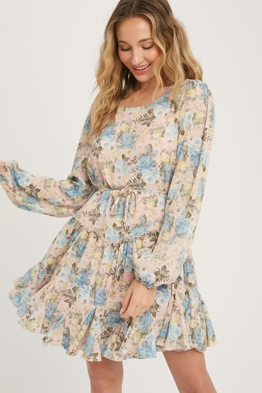 Dusty pink floral print ruffled swing dress made from light chiffon fabric.