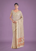 Beige and red cotton silk saree with woven butti patterns and golden zari border