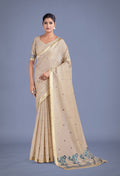 Beige and blue cotton silk saree with woven butti pattern and golden zari border