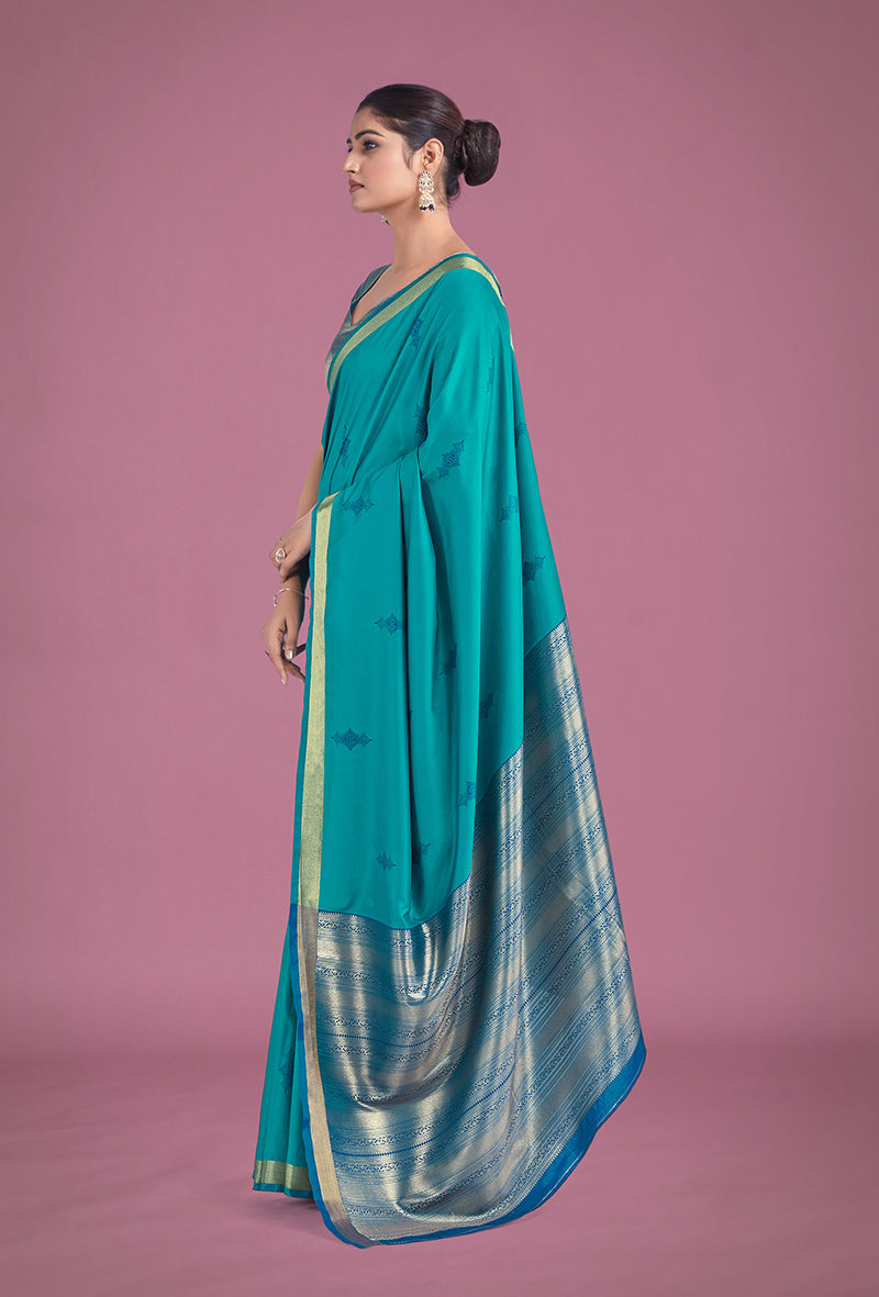 Turquoise Silk Saree With Golden Zari Woven Border