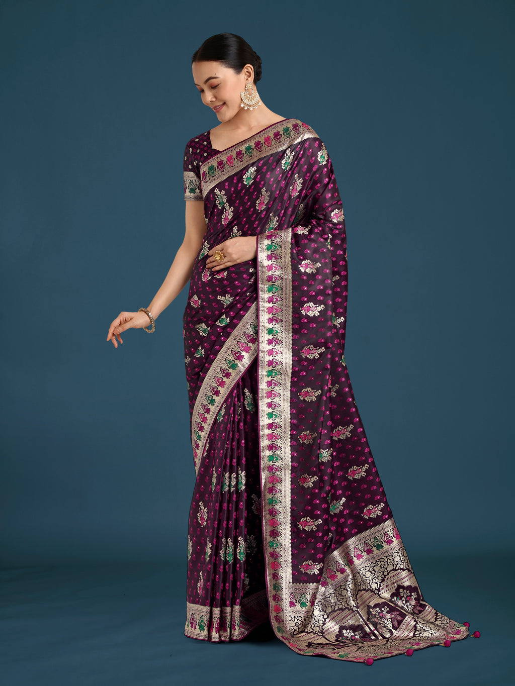 Wine colored Banarasi Satin Silk saree with intricate gold Zari woven borders.