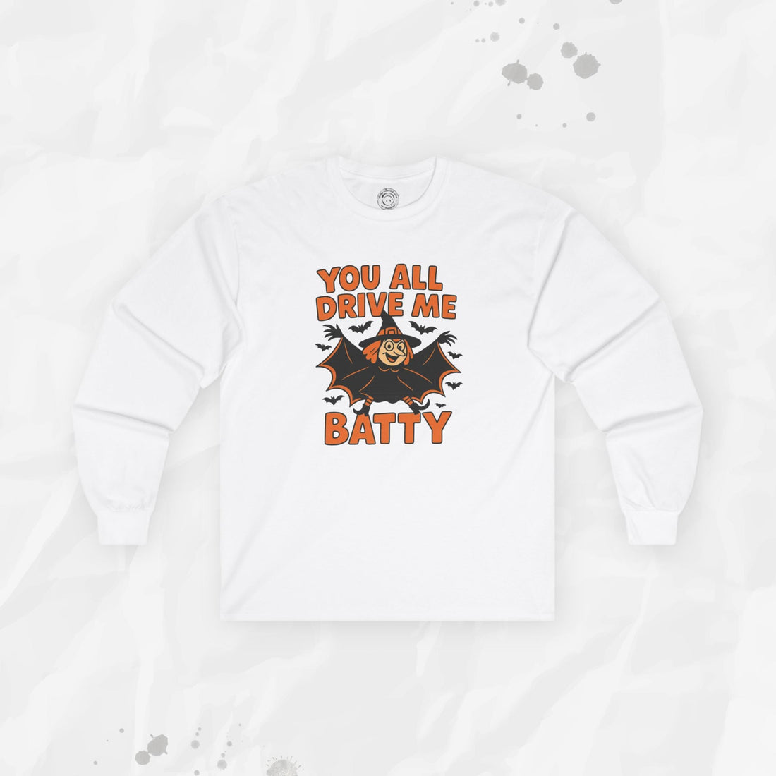 Long sleeve graphic t-shirt featuring a cartoon witch bat and text saying You All Drive Me Batty