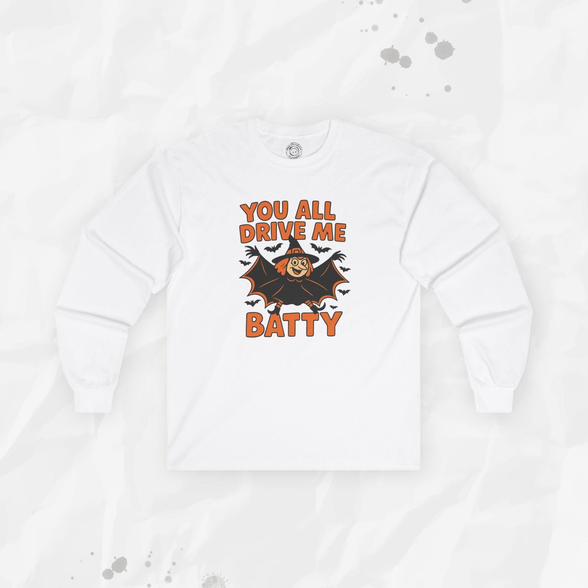 Long sleeve graphic t-shirt featuring a cartoon witch bat and text saying You All Drive Me Batty