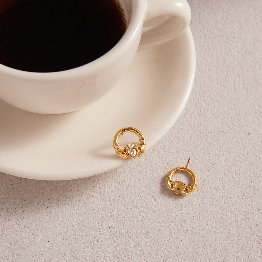 18K gold-plated friendship hand stud earrings with cubic zirconia detail