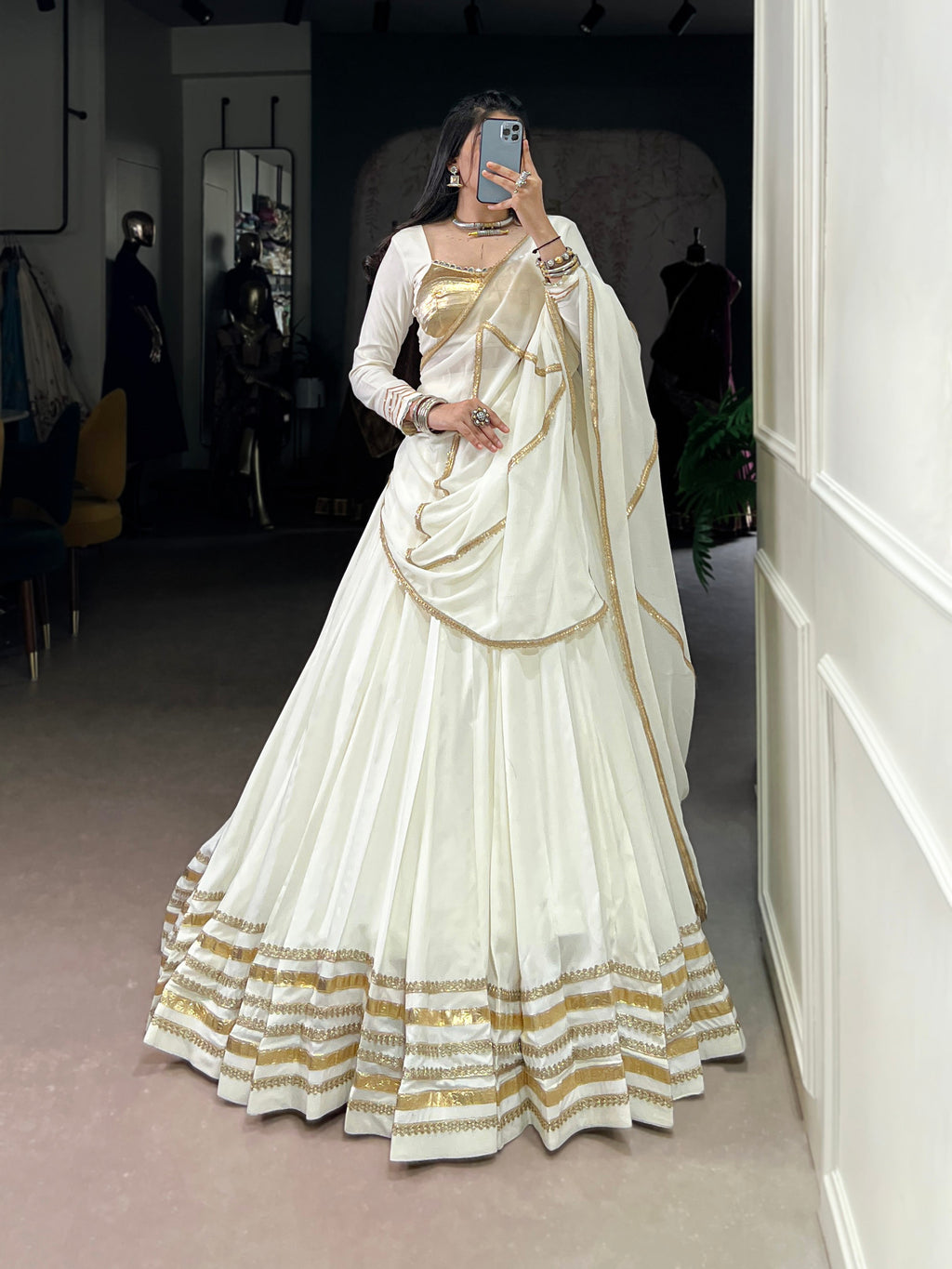 White pure rayon lehenga choli with lace detailing and dupatta, perfect for festive Navratri wear