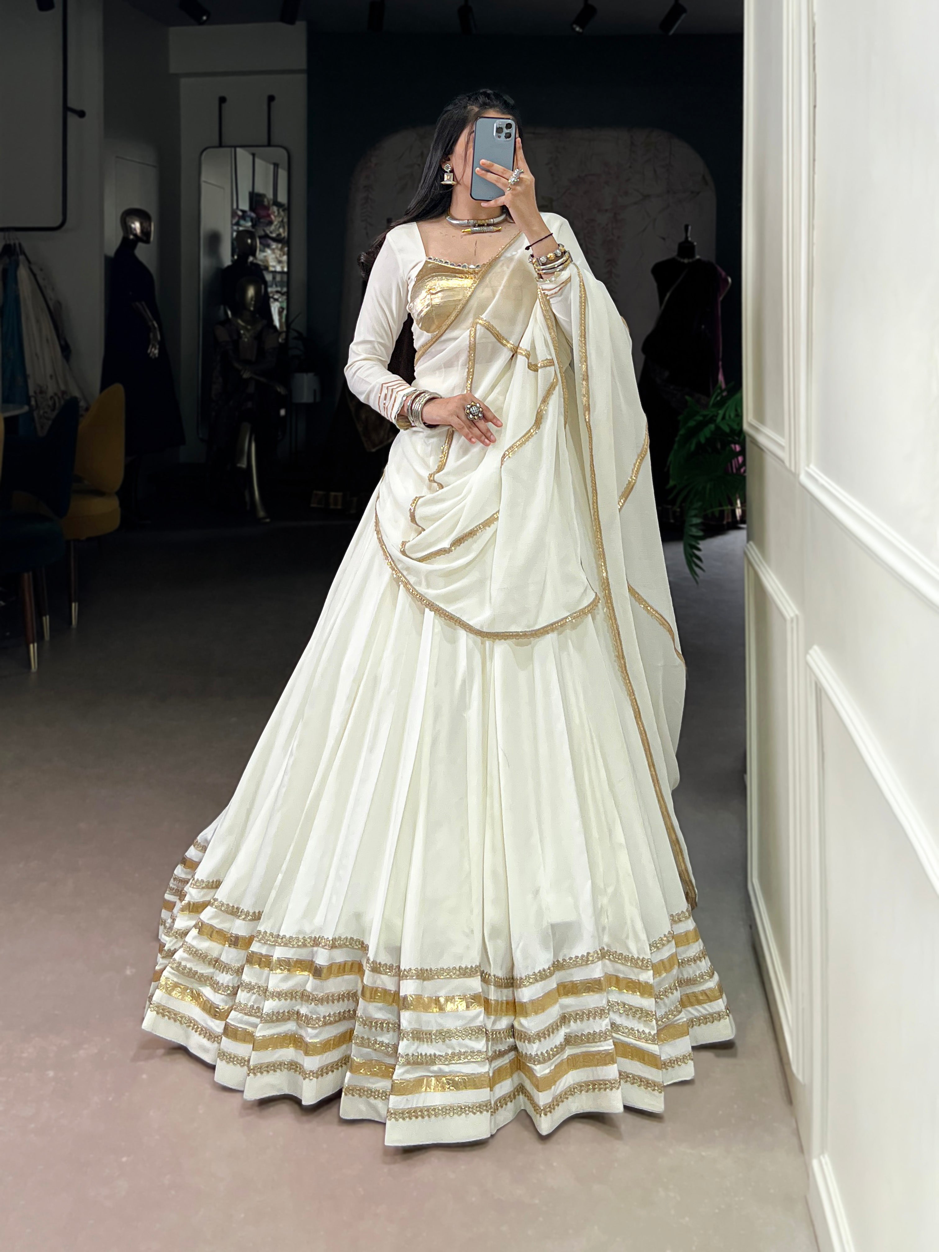 White pure rayon lehenga choli with lace detailing and dupatta, perfect for festive Navratri wear