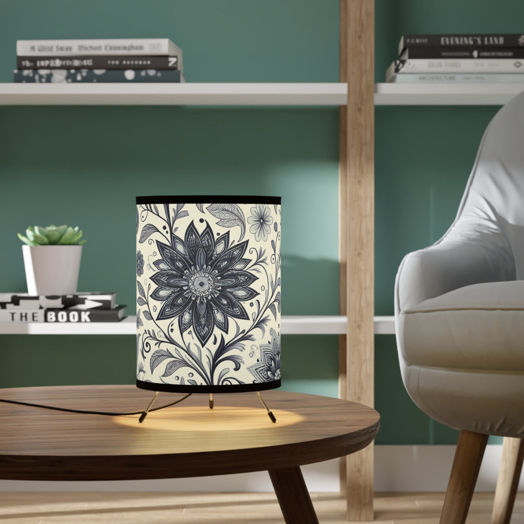 An elegant tripod floor lamp featuring a high-resolution floral print shade in a modern living room.