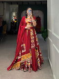 Maroon lehenga choli featuring printed silk details and a matching dupatta