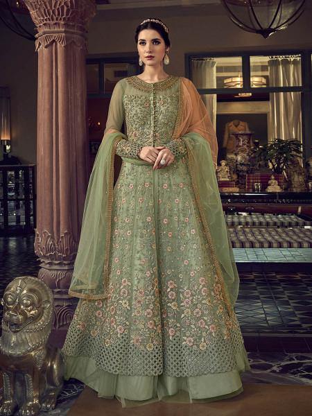 A floor-length Pista green embroidered butterfly net Anarkali suit with floral patterns and long sleeves.