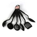 Set of non-stick rubber kitchen utensils including scoops and shovels
