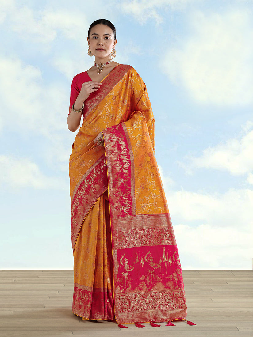 Orange Banarasi Silk saree with detailed golden zari border and traditional zaal patterns