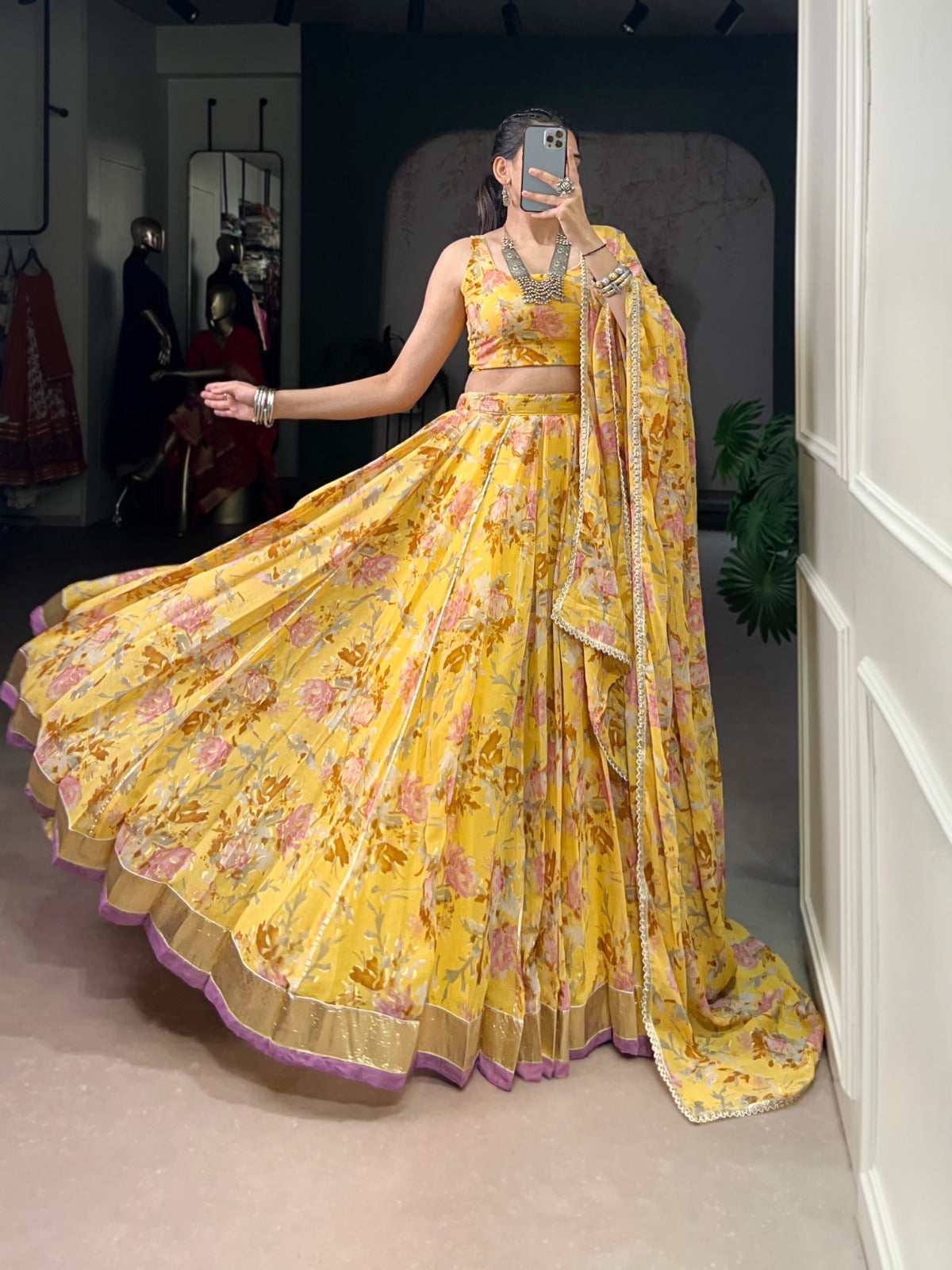 Yellow floral print chiffon lehenga choli with foil print and gotta patti lace detailing