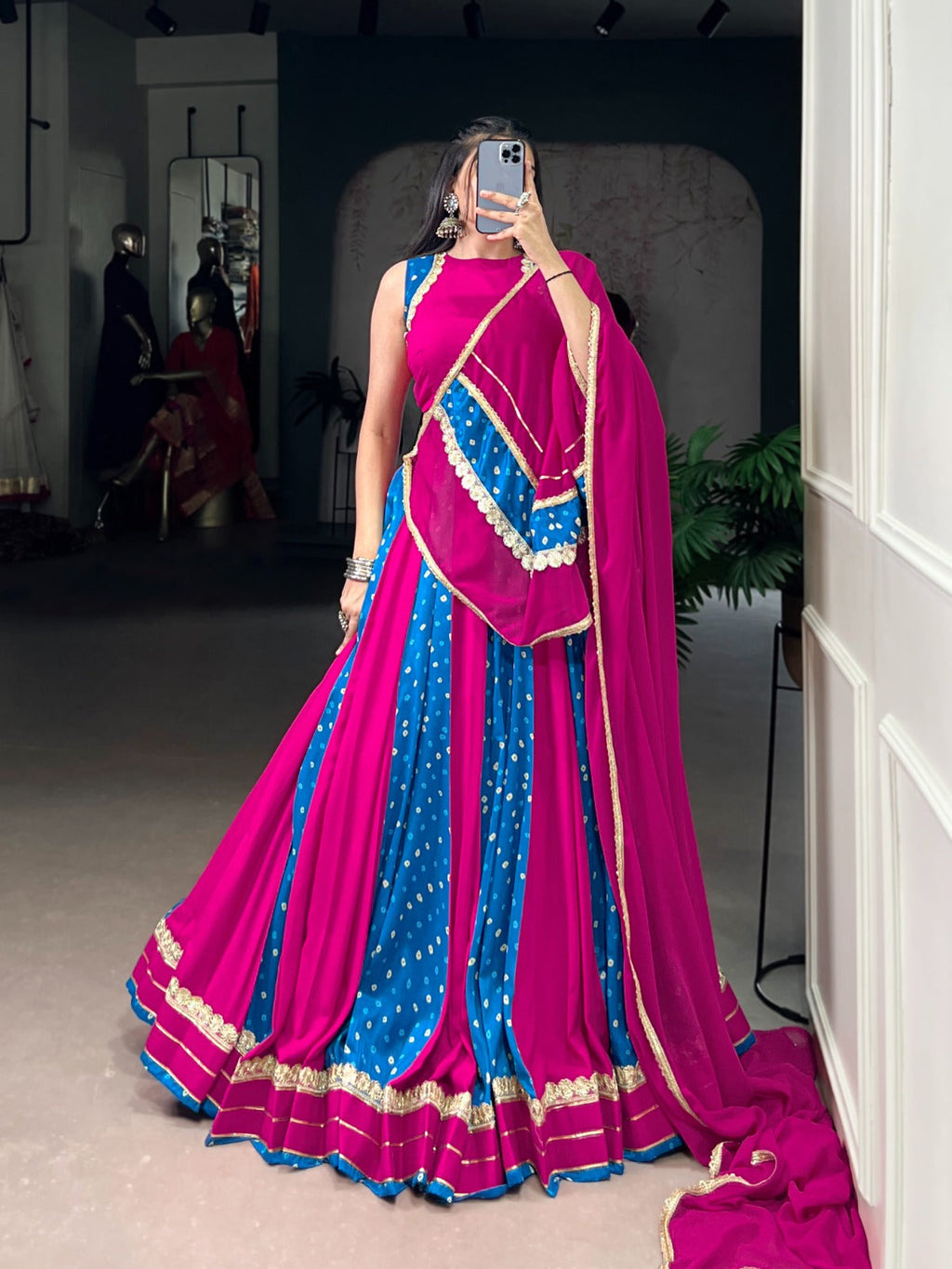 Pink Tasar silk lehenga choli with traditional Bandhej print and lace border
