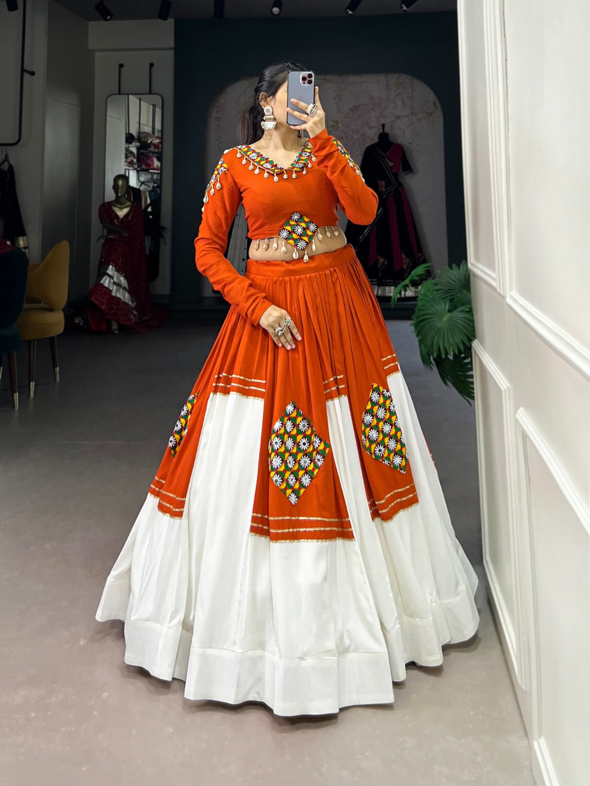 Orange pure rayon lehenga choli with traditional Gamthi patch work and gold Gota Patti embellishments