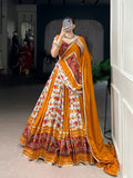 Mustard Printed Silk Patola Lehenga Choli with Gamthi Work