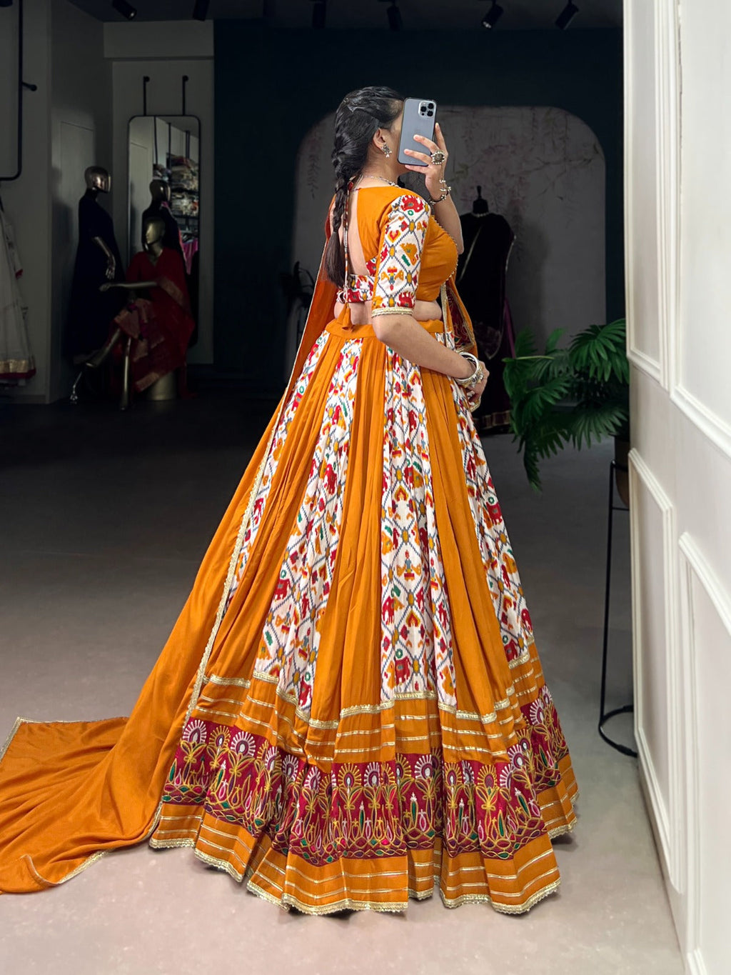 Mustard Printed Silk Patola Lehenga Choli with Gamthi Work