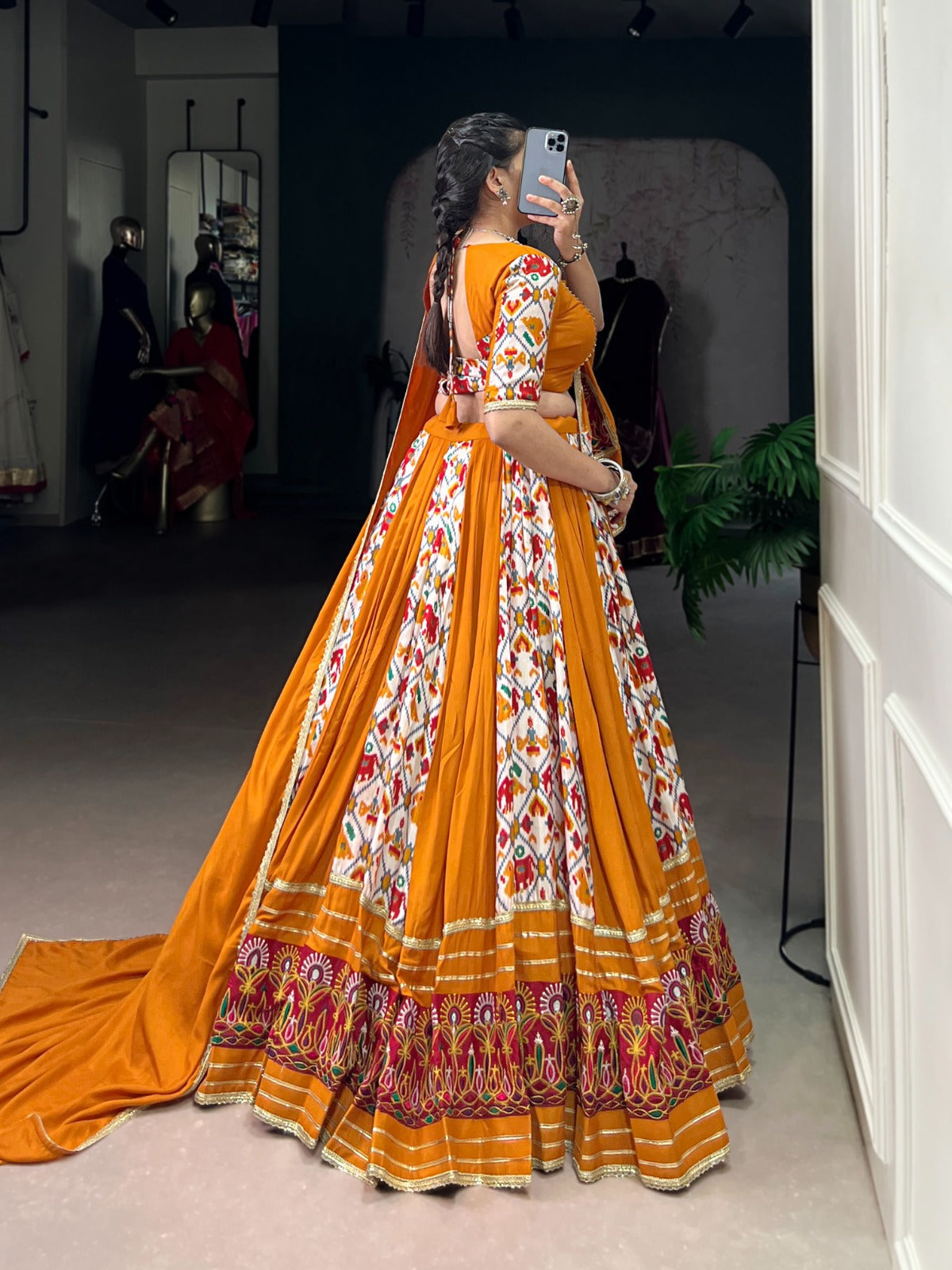 Mustard Printed Silk Patola Lehenga Choli with Gamthi Work