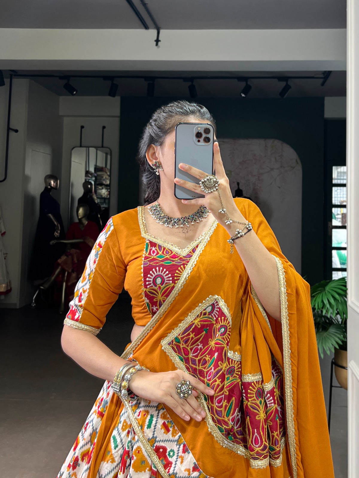 Mustard Printed Silk Patola Lehenga Choli with Gamthi Work