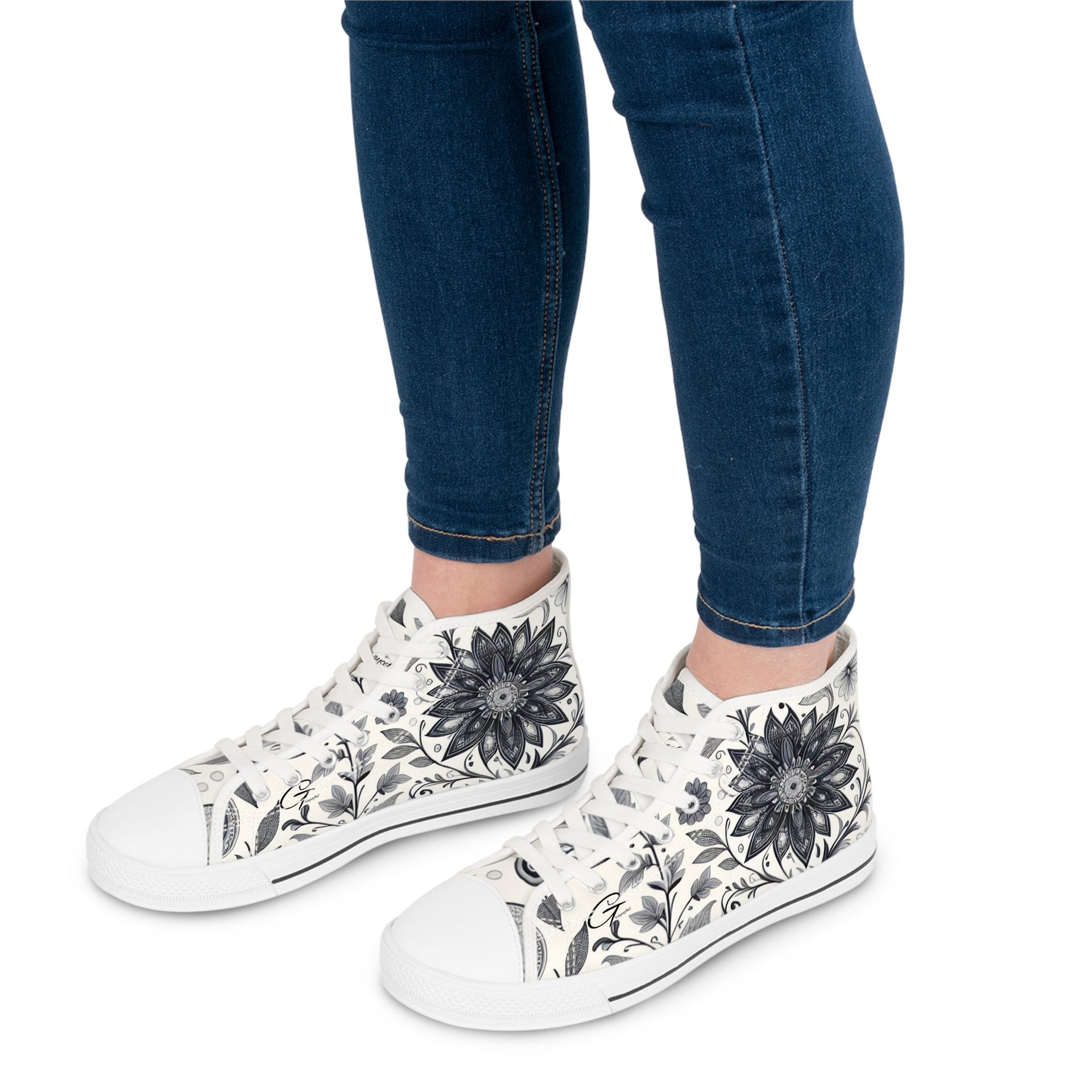 A pair of women's floral print high top sneakers with memory foam insoles.