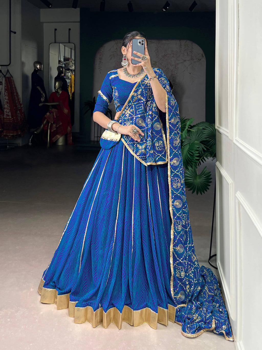 Blue georgette Bandhej print lehenga with Gota Patti and lace work
