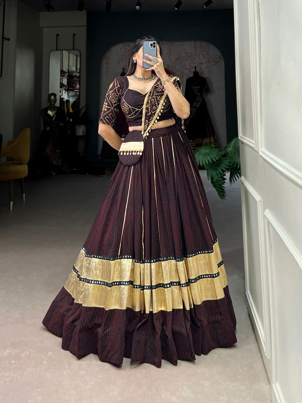 Black and maroon georgette lehenga with traditional Bandhej print and mirror work