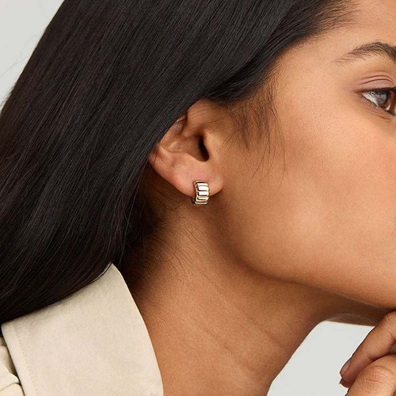 C-shaped 18K gold-plated sterling silver hoop earrings with a polished finish.