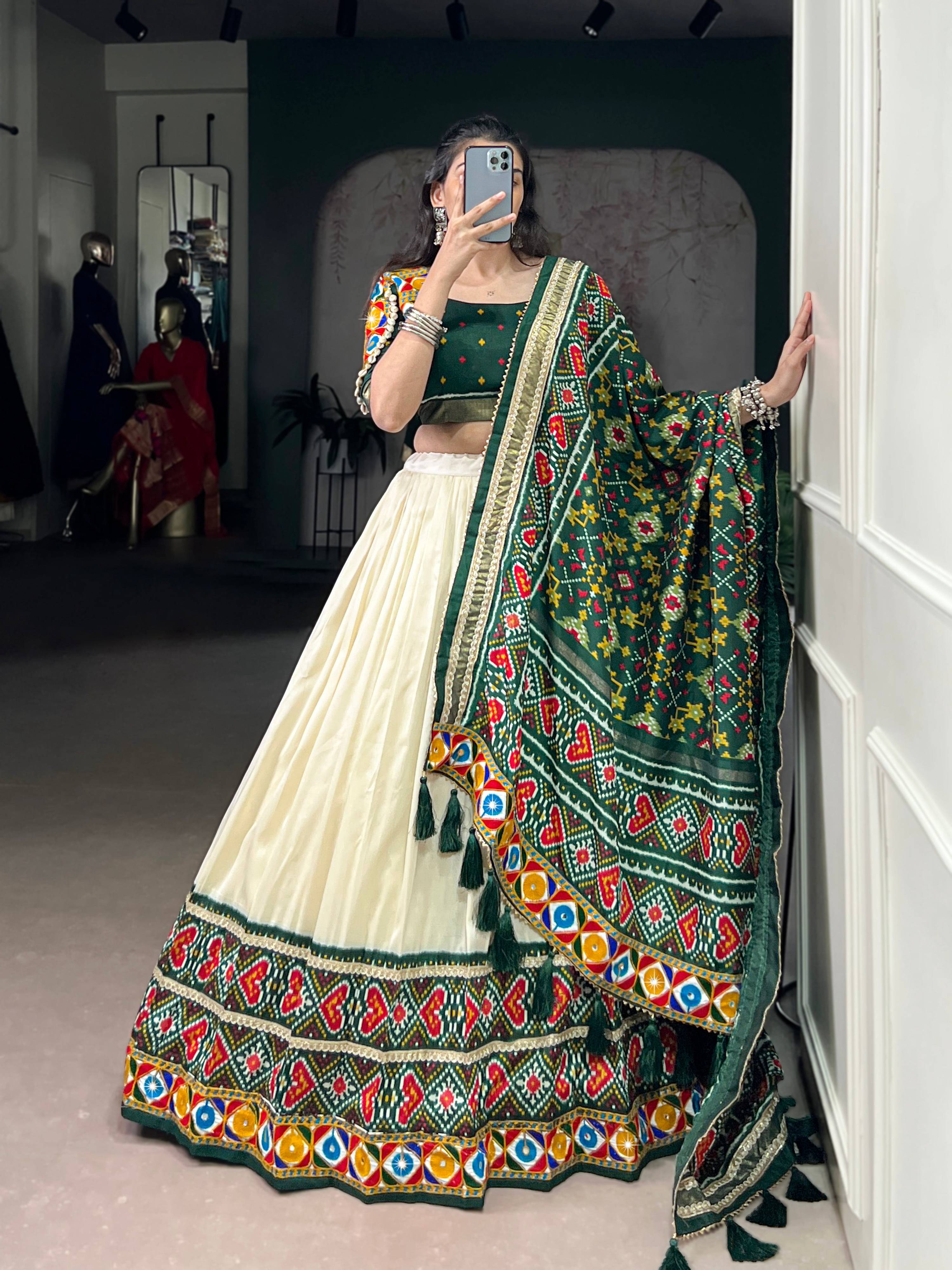 Off-White Tasar Silk Patola Print Lehenga Choli with Mirror Work