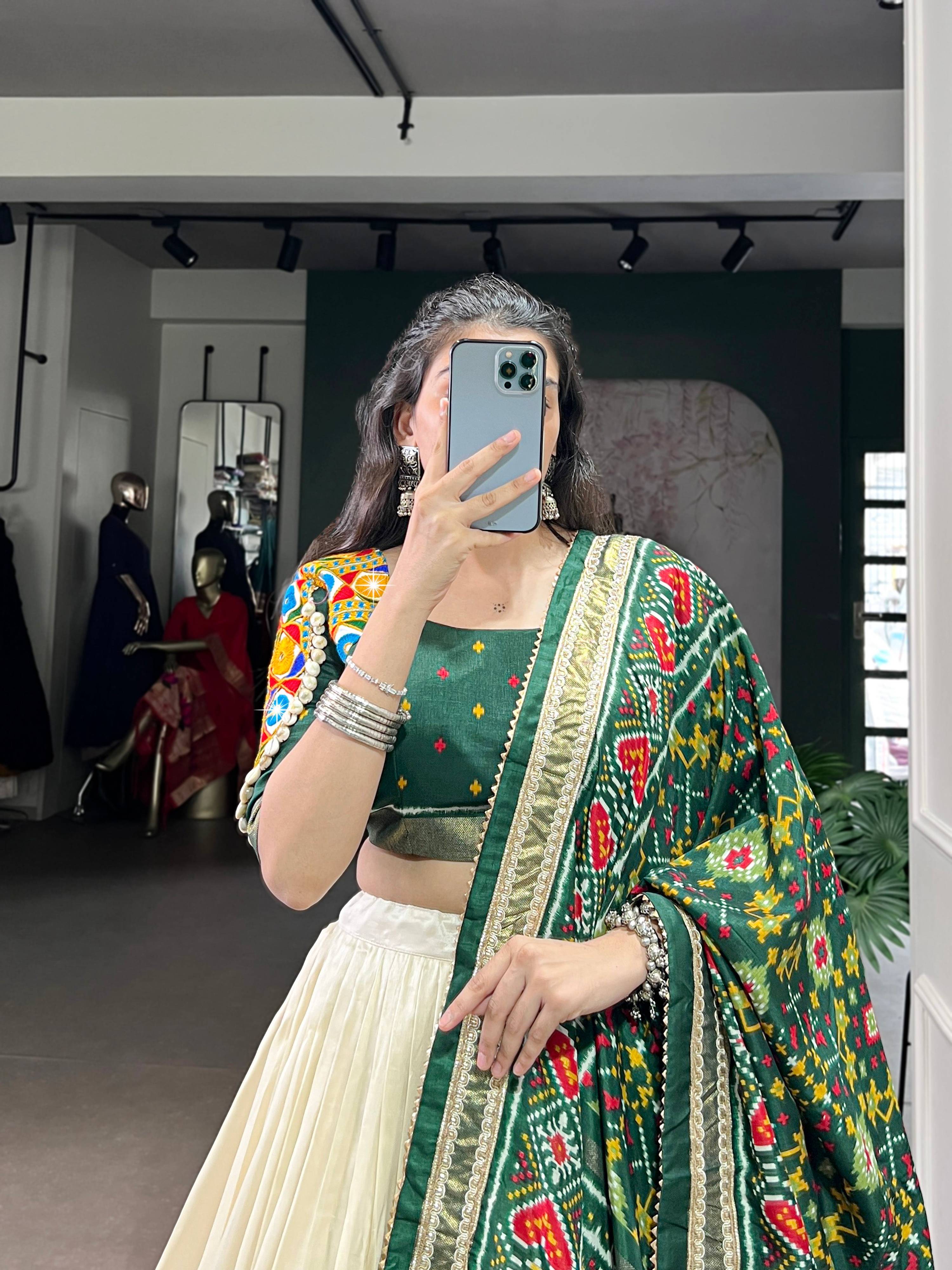 Off-White Tasar Silk Patola Print Lehenga Choli with Mirror Work