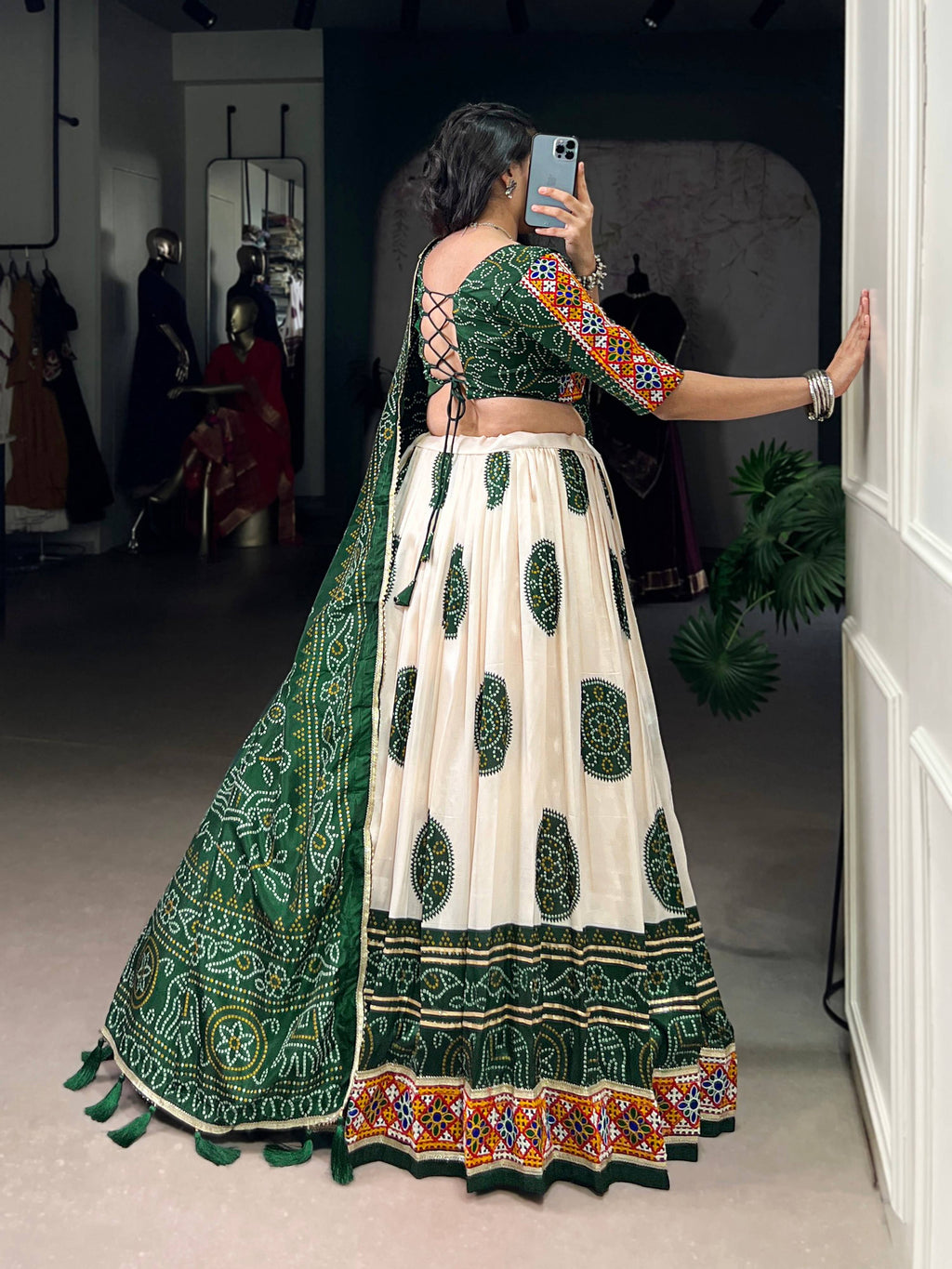Off-White Tasar Silk Geometric Bandhej Lehenga with Dark Green Details
