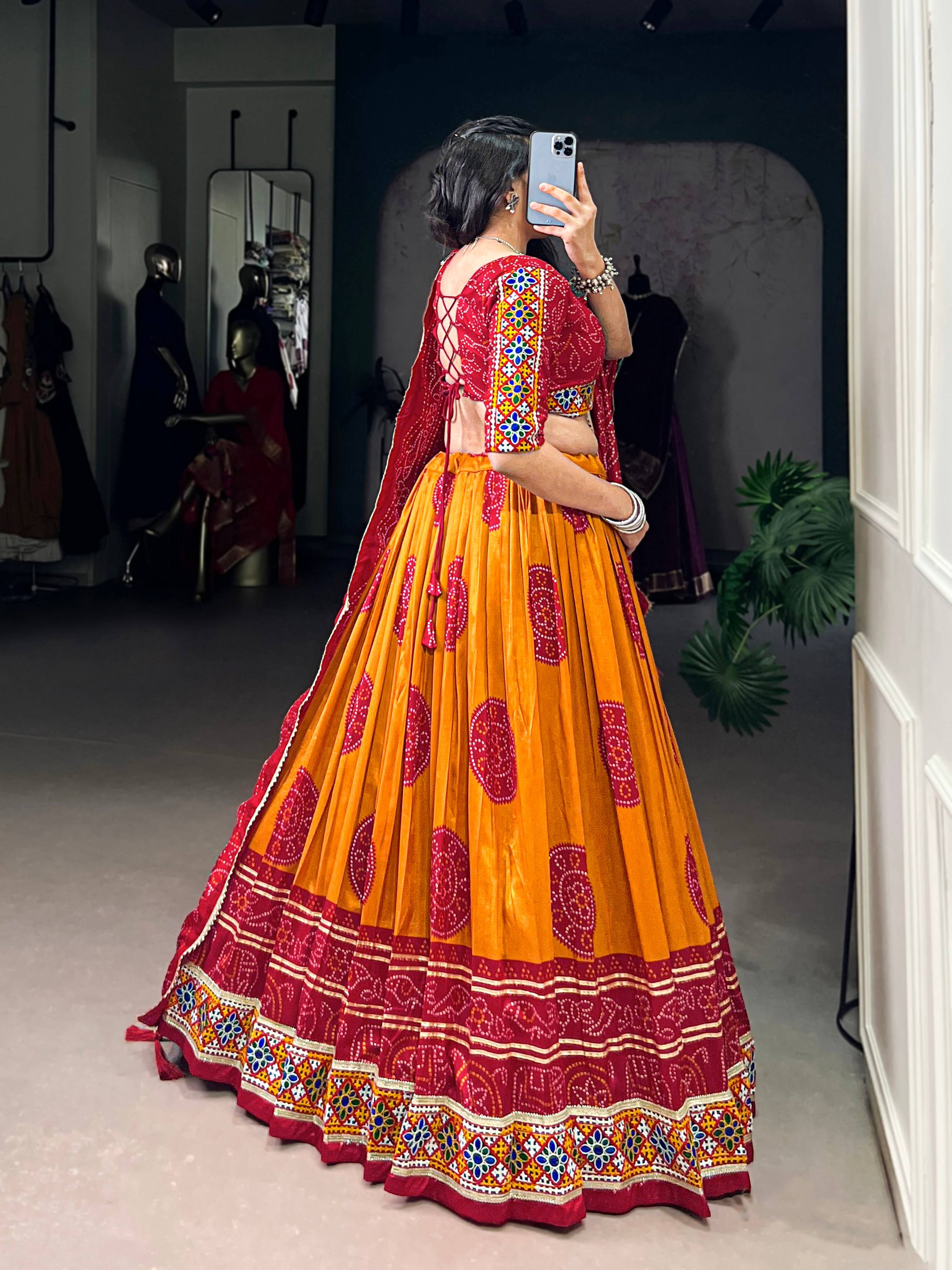 Mustard Tasar Silk Bandhej Print Lehenga Choli with Gamthi Work