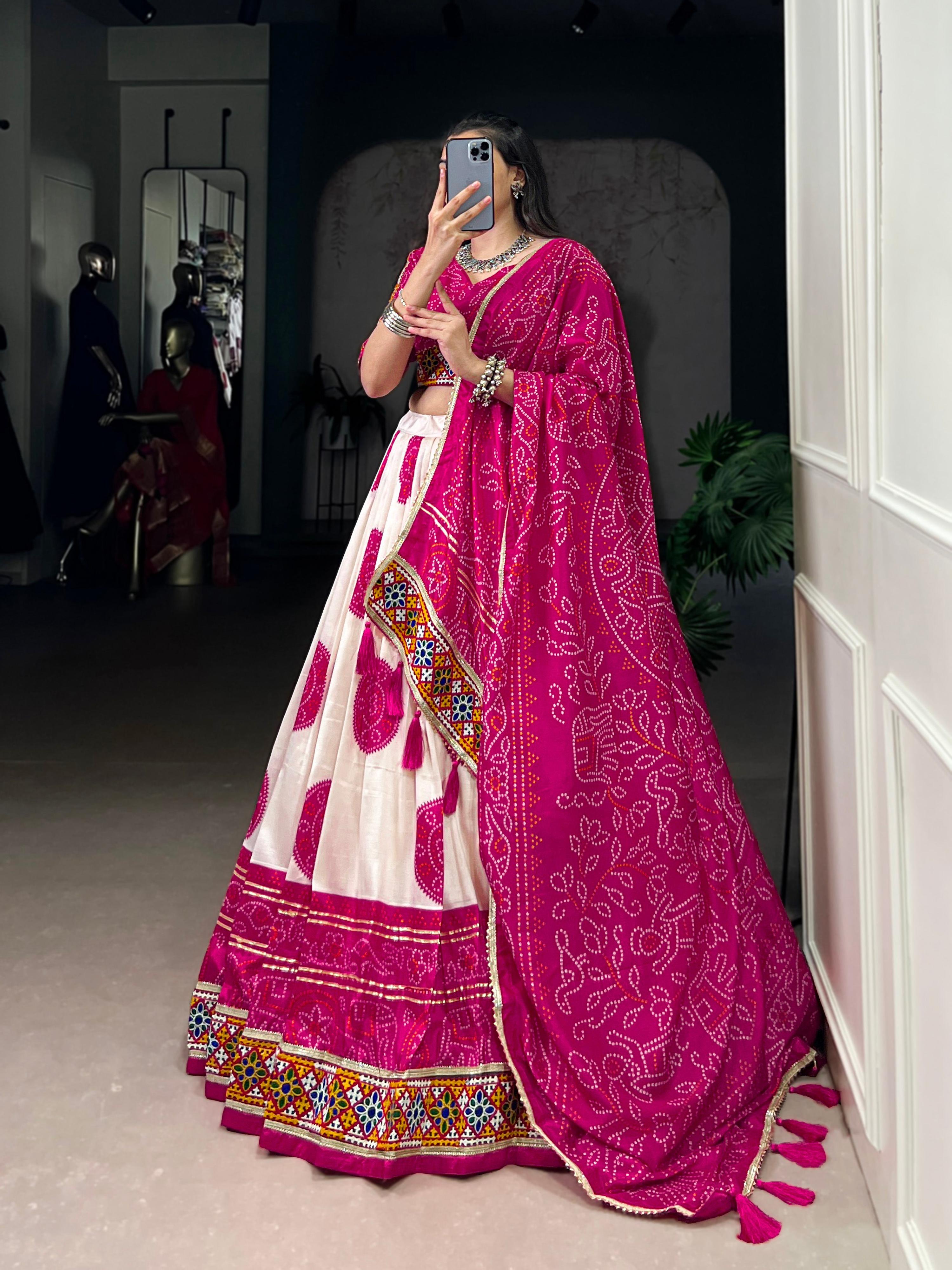 Off-White Tasar Silk Bandhej Lehenga Choli with Magenta Accents
