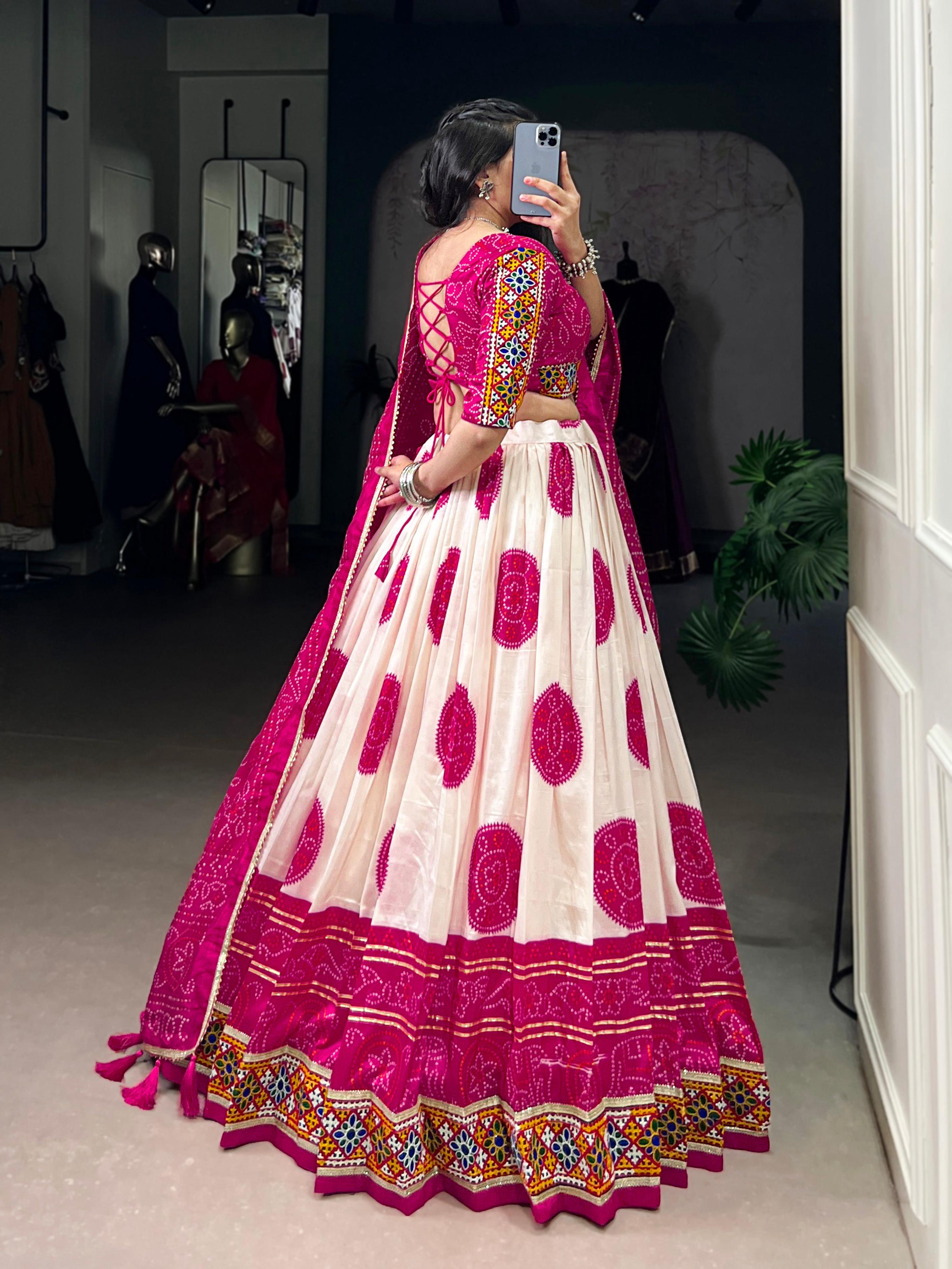 Off-White Tasar Silk Bandhej Lehenga Choli with Magenta Accents