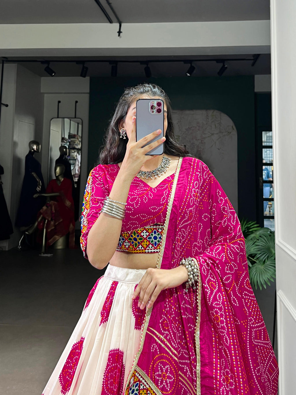 Off-White Tasar Silk Bandhej Lehenga Choli with Magenta Accents