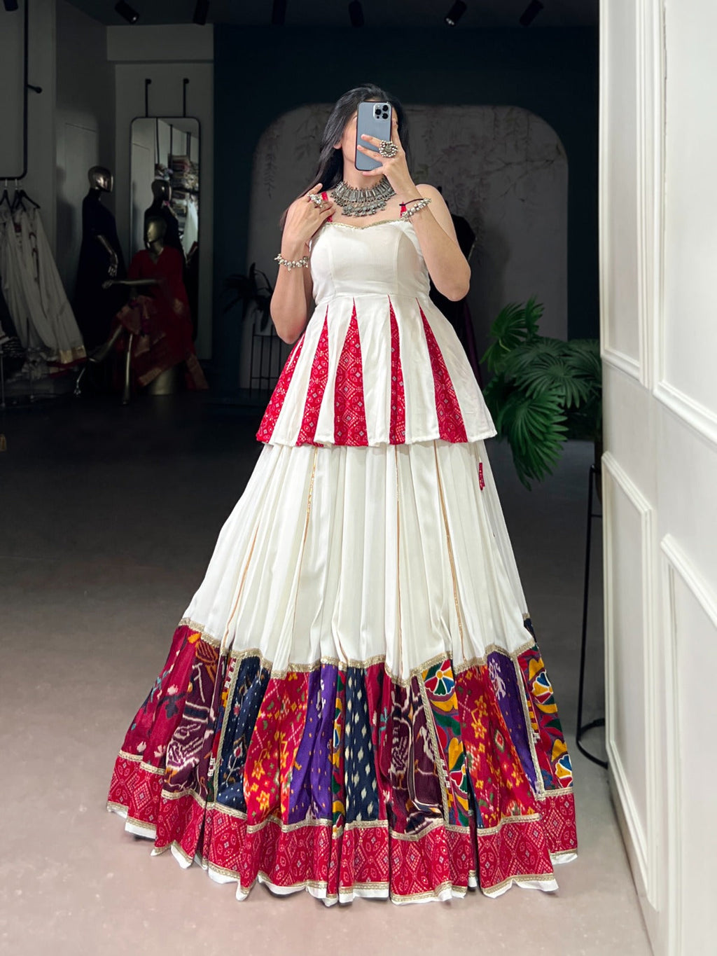 White pure rayon lehenga choli featuring multi-patch work and elegant lace trim
