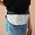 Compact fanny pack worn as a waist bag for hands-free convenience